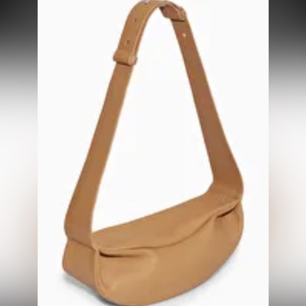 COS swing Bag. Tan color. Excellent condition